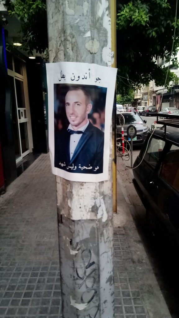 Poster for one of the dead of the Beirut port explosion, Beirut. Text reads: “Joe Andoon the Hero: he is a victim, not a martyr”.