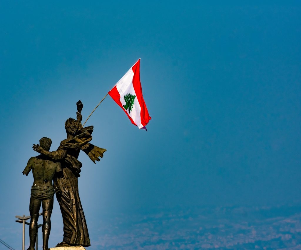 Martyrs monument with Lebanon flag at Martyrs square in Beirut, Lebanon